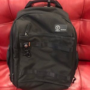 Tumi backpack and laptop sleeve